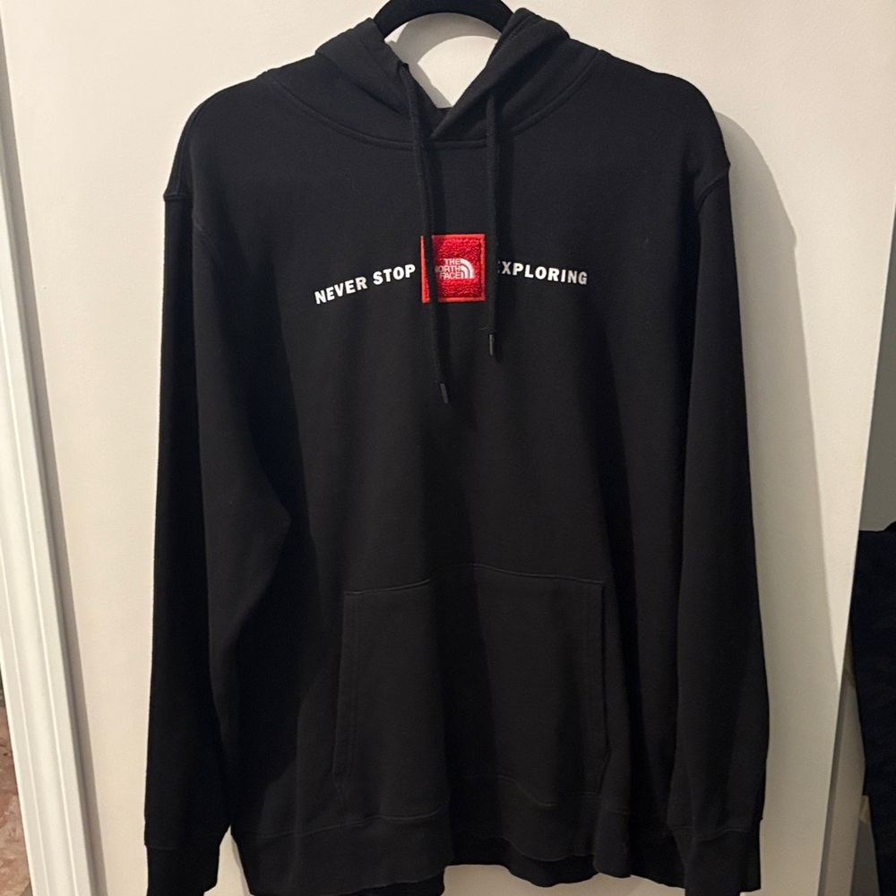The North Face Black Hoodie with Red Logo